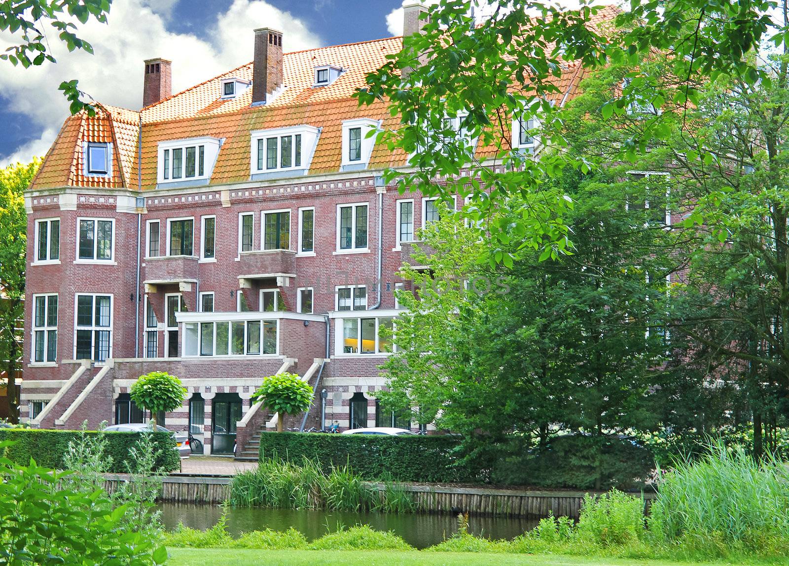 Mansion on a canal in Amsterdam. Netherlands