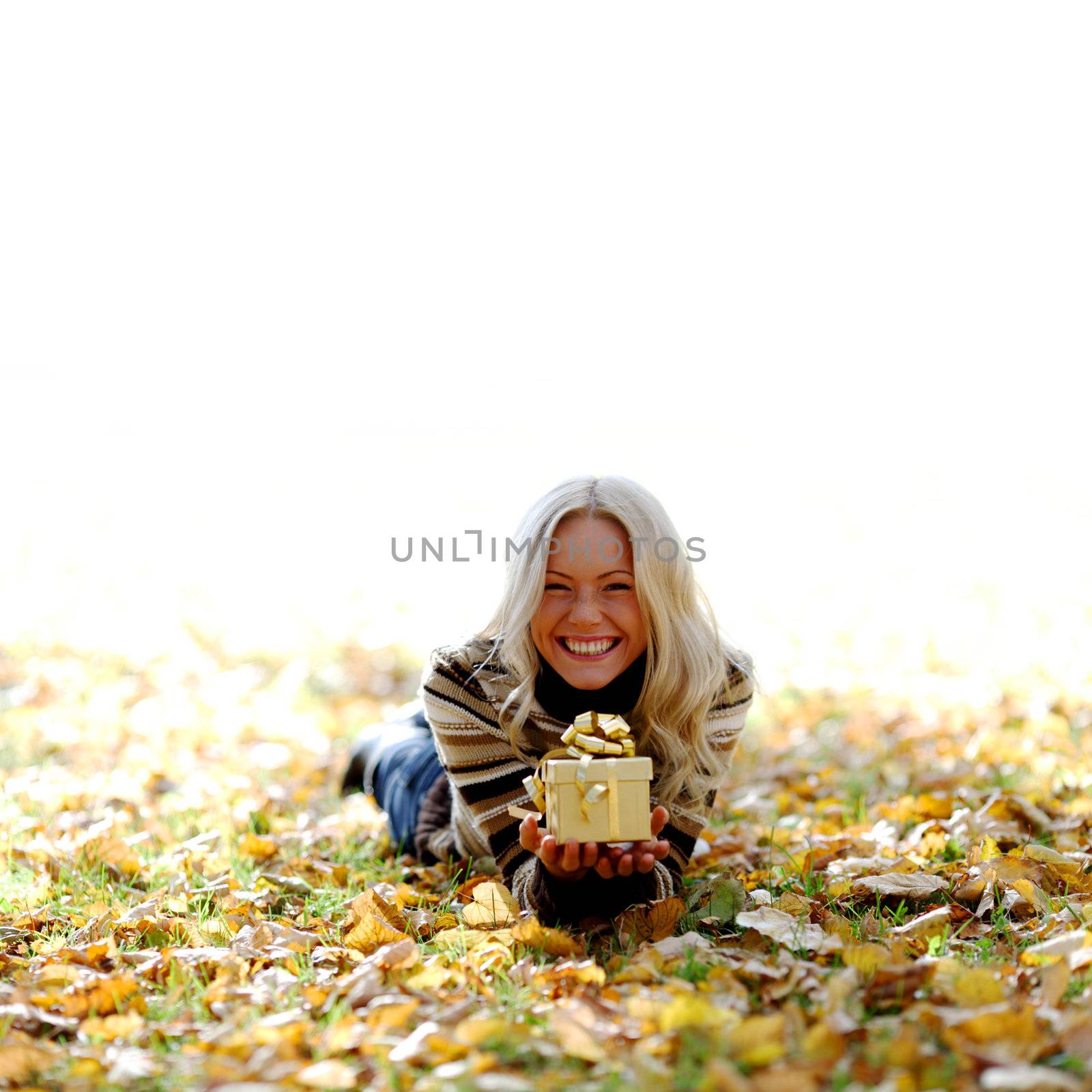 woman take autumn gift in park