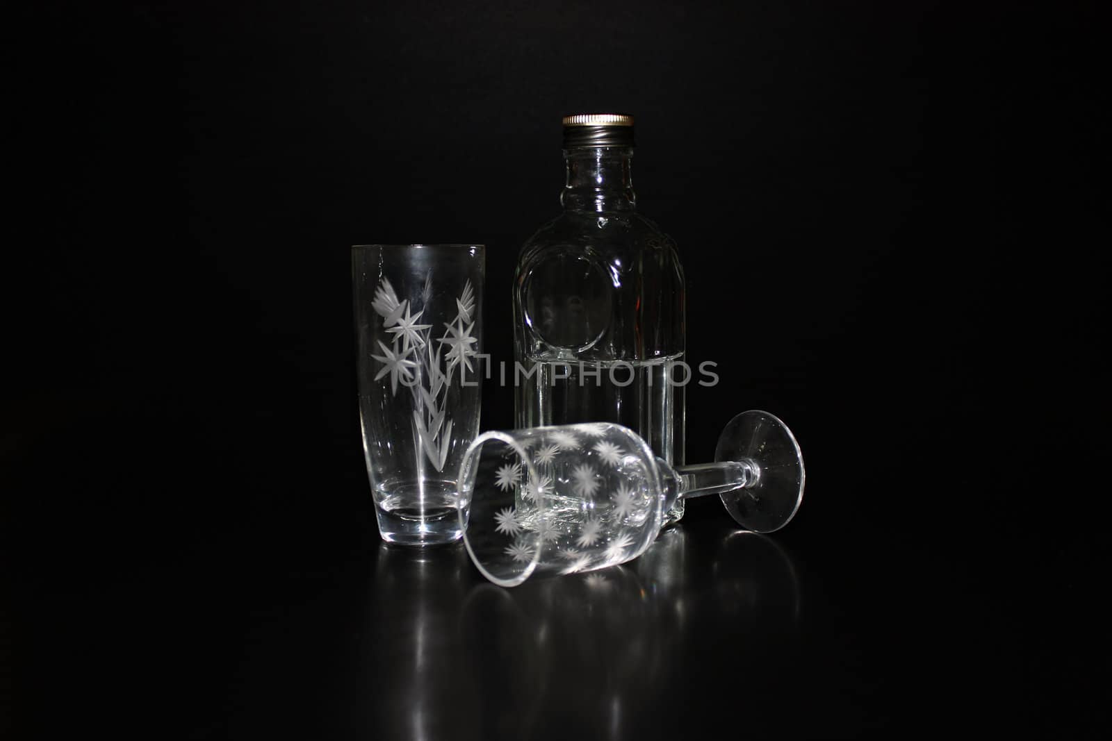 Cut-glass ware and bottle with vodka by sergpet