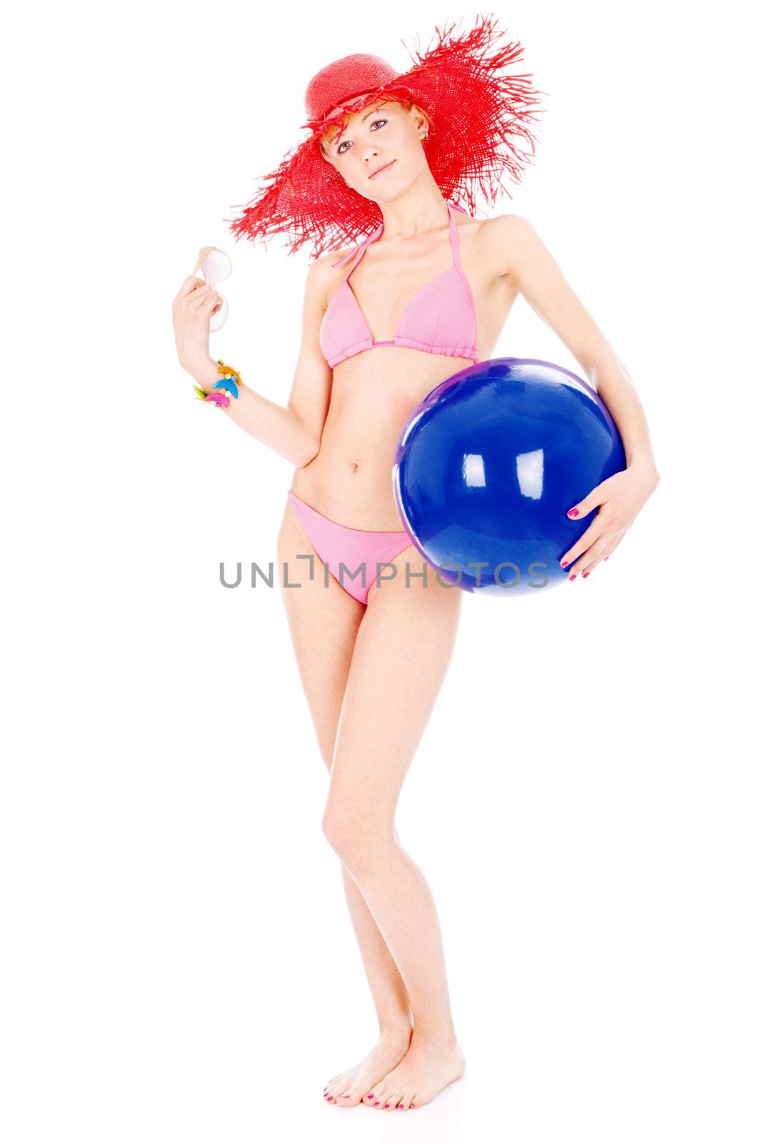 Woman in bikini with ball and glasses in hand, isolated on white