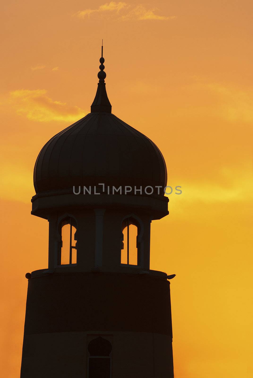 silhouette of a mosque dome during a beautiful sunset
