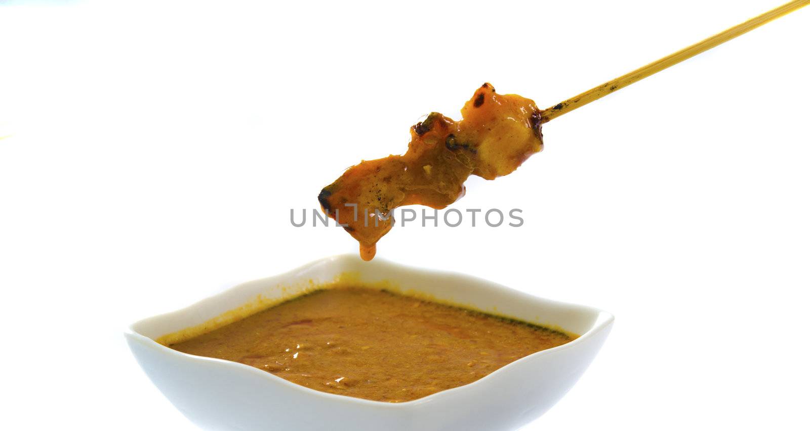 Delicious chicken satay on skewers
