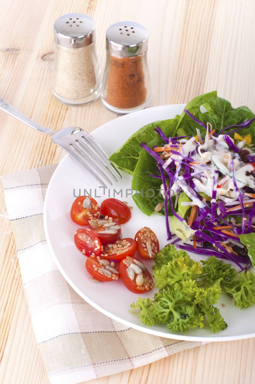 salad in a plate with kitchen background