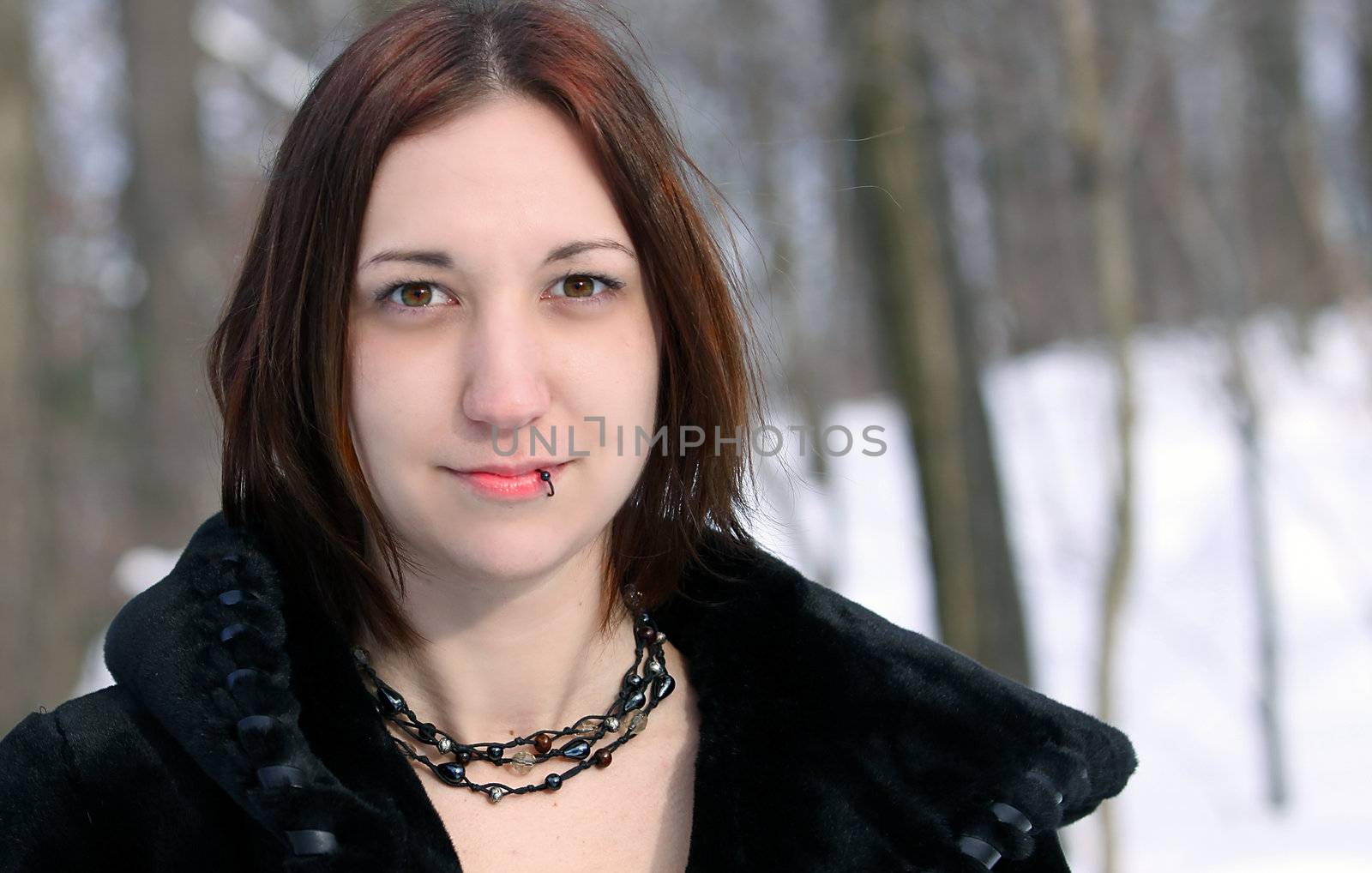 Beautiful, alternative model with lip piercing