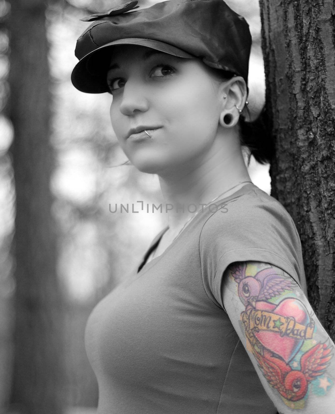 lady in hat with tattoos, selective color