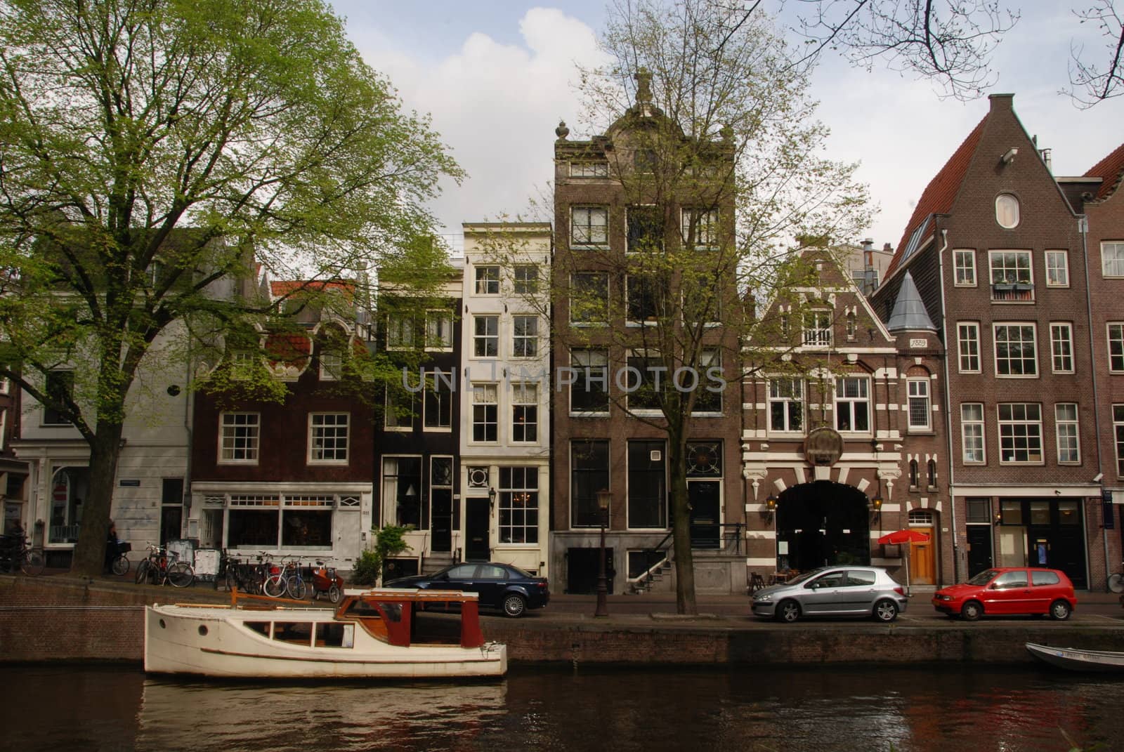 Amsterdam, Canal and traditional houses. Holland. 
