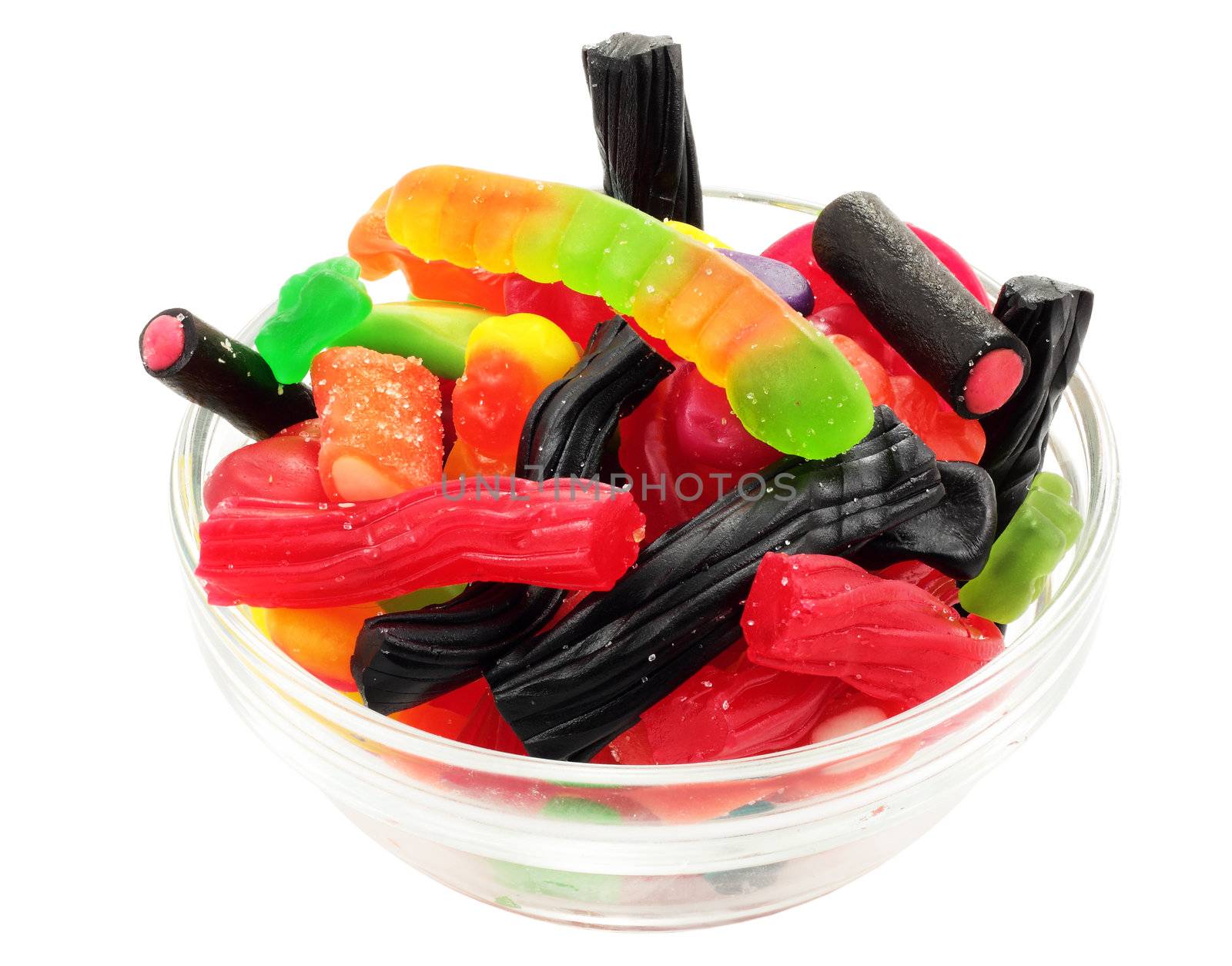 Plate with a selection of candies or soft gelatin in a variety of forms and colors flavors isolated with clipping path
