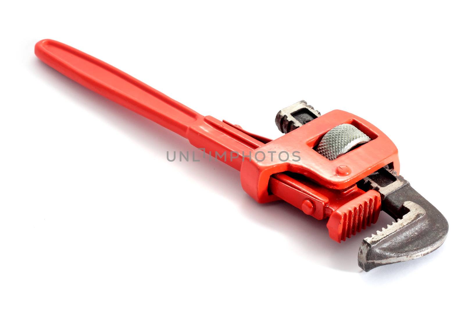 adjustable spanner colored red for plumbing isolated on fund in horizontal