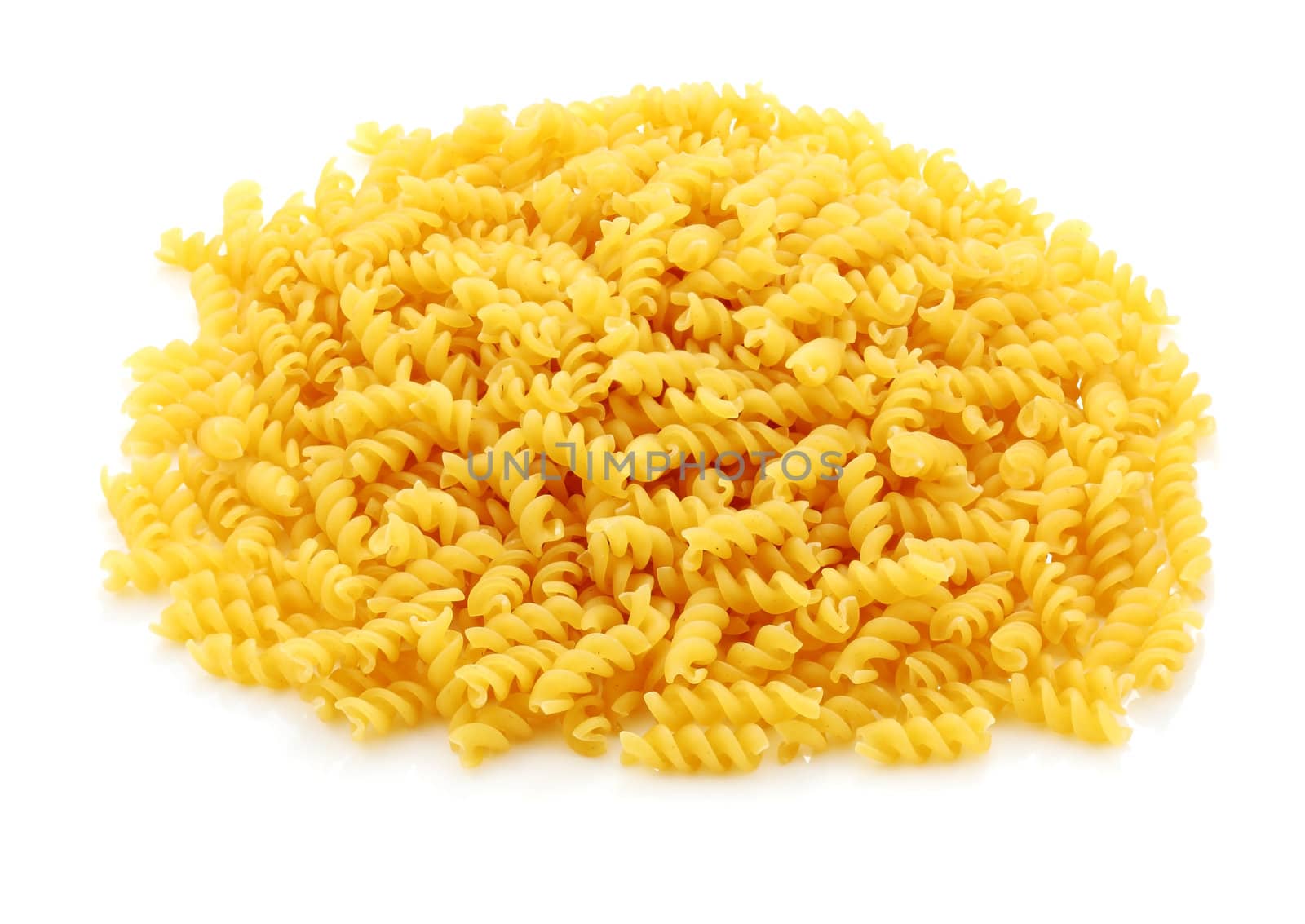 lots of macaroni with spiral-shaped isolated