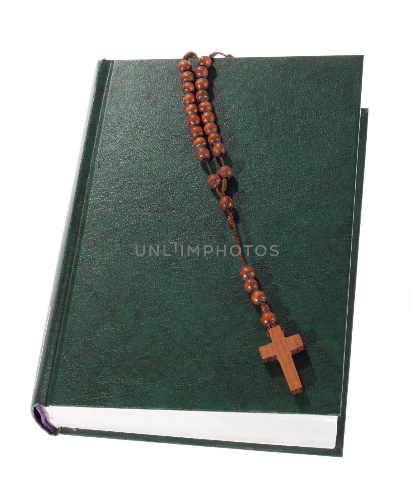 Wooden rosary on the Bible by aguirre_mar