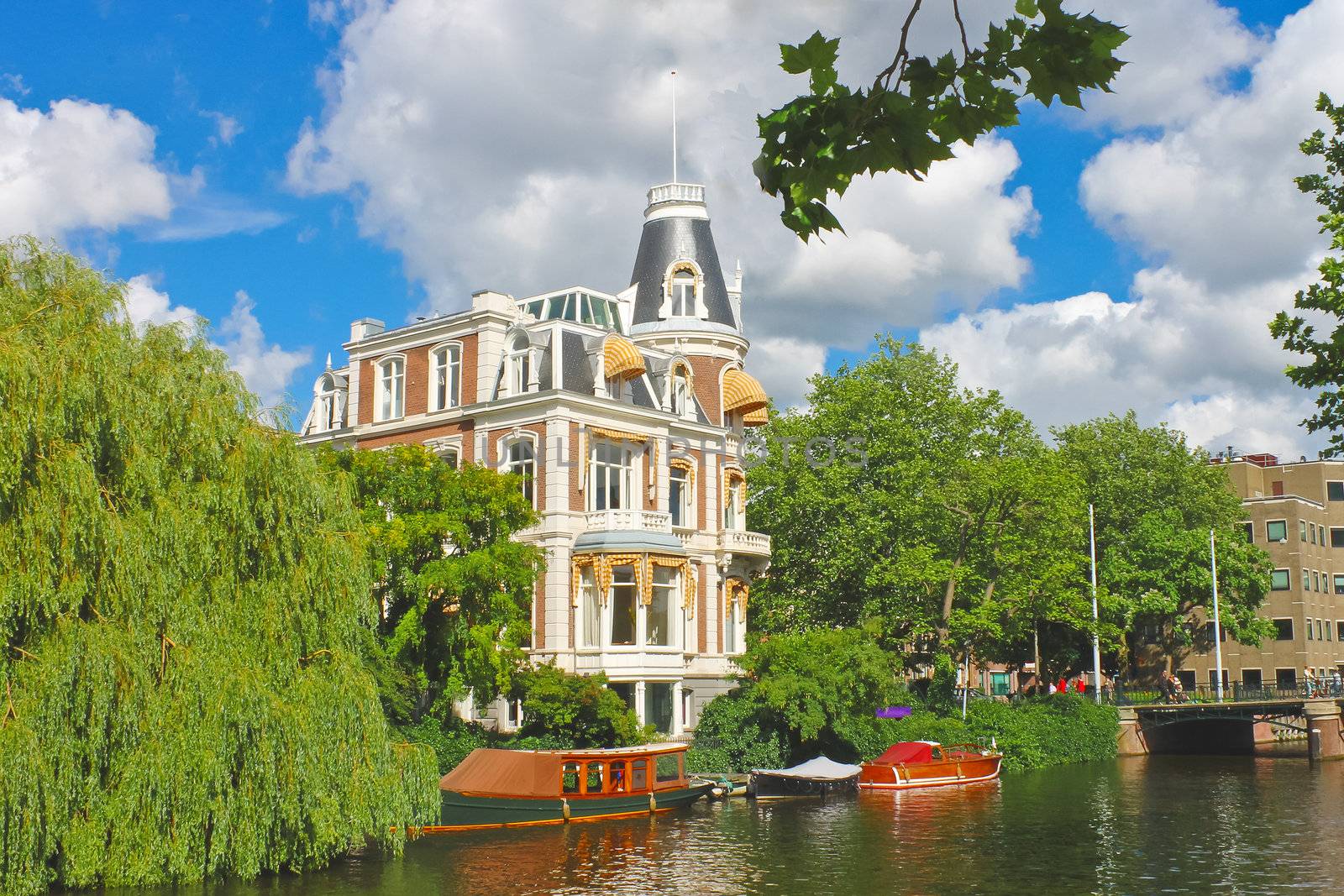 Beautiful mansion on a canal in Amsterdam. Netherlands by NickNick