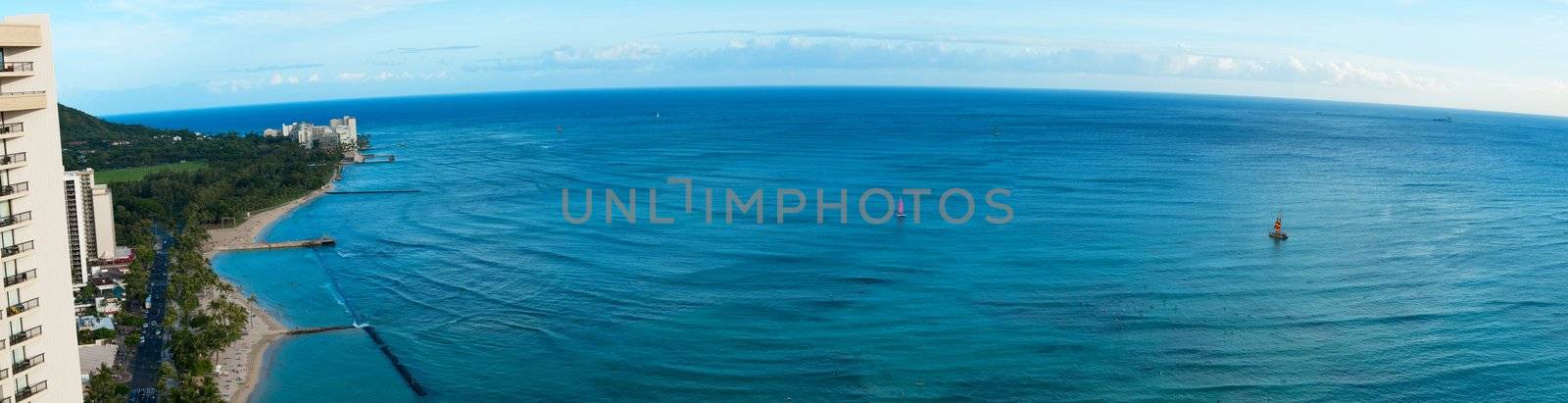 A panoramic shot of the ocean off the coast of Oahu at Waikiki from the 38th floor