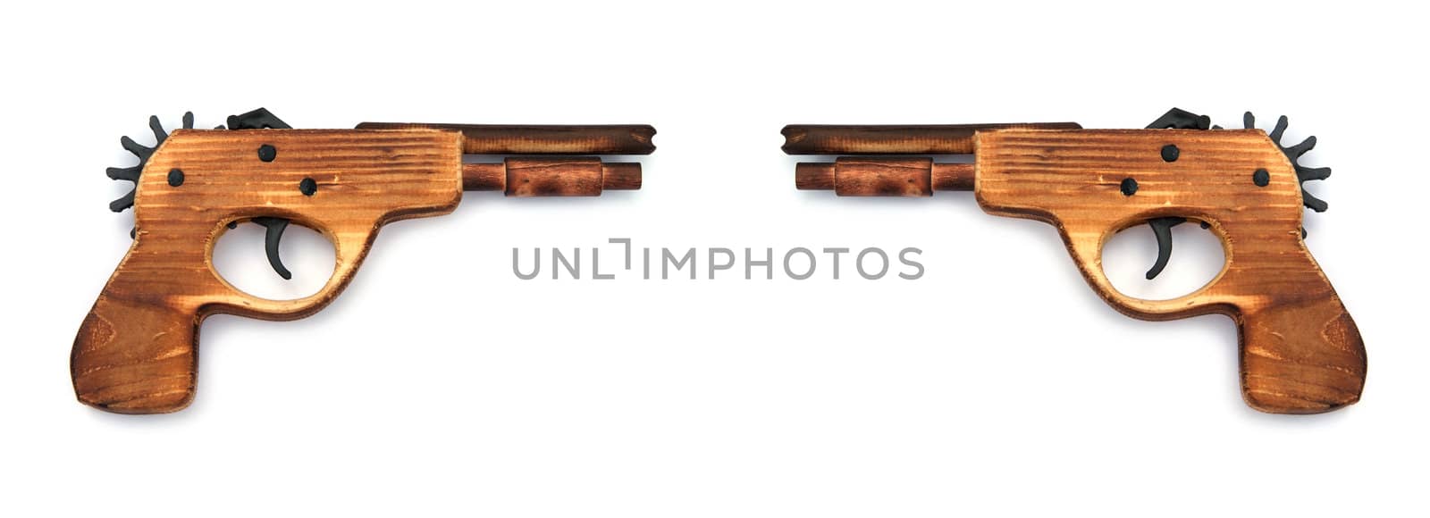 Toy wooden gun , on a white background  by opasstudio