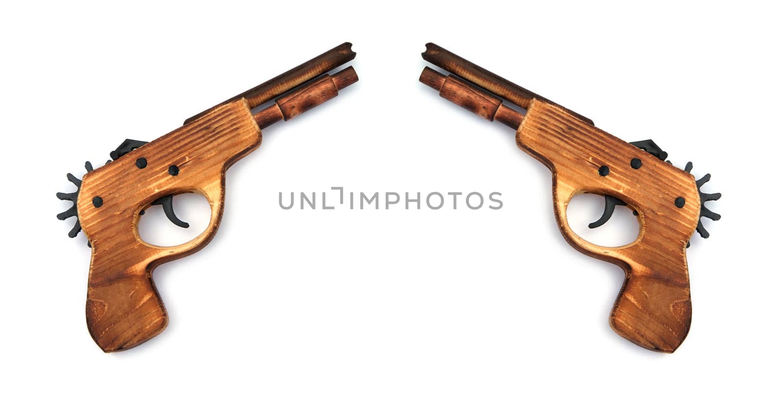 Toy wooden gun , on a white background  by opasstudio