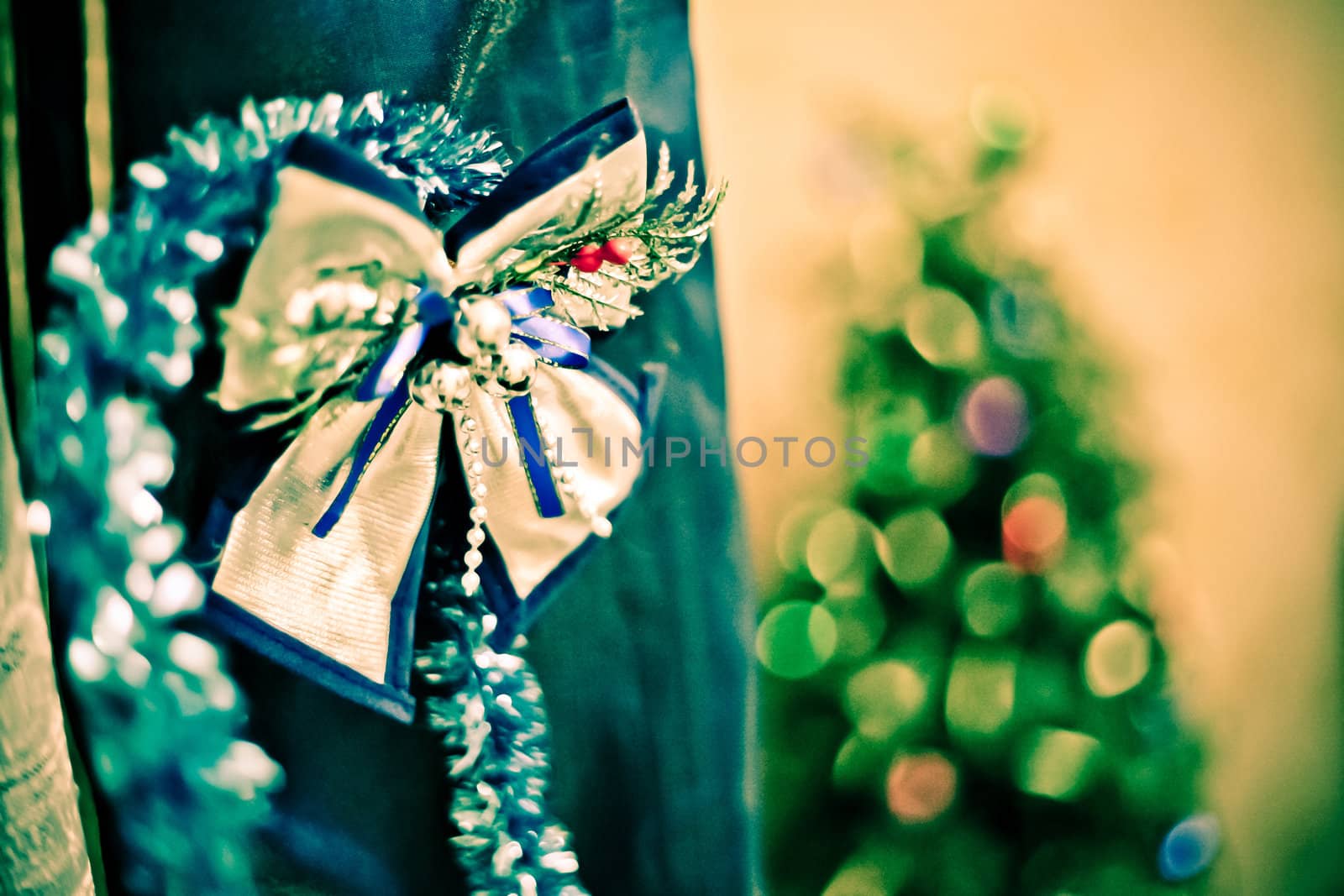 Bow at the curtain. Christmas decoration