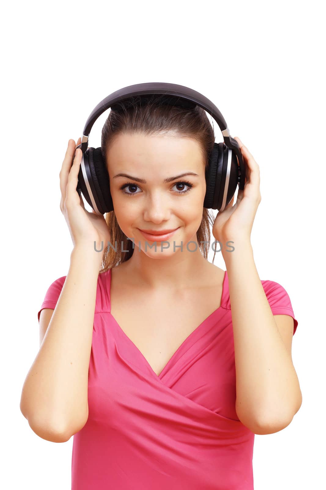 Happy smiling girl dancing and listening to music