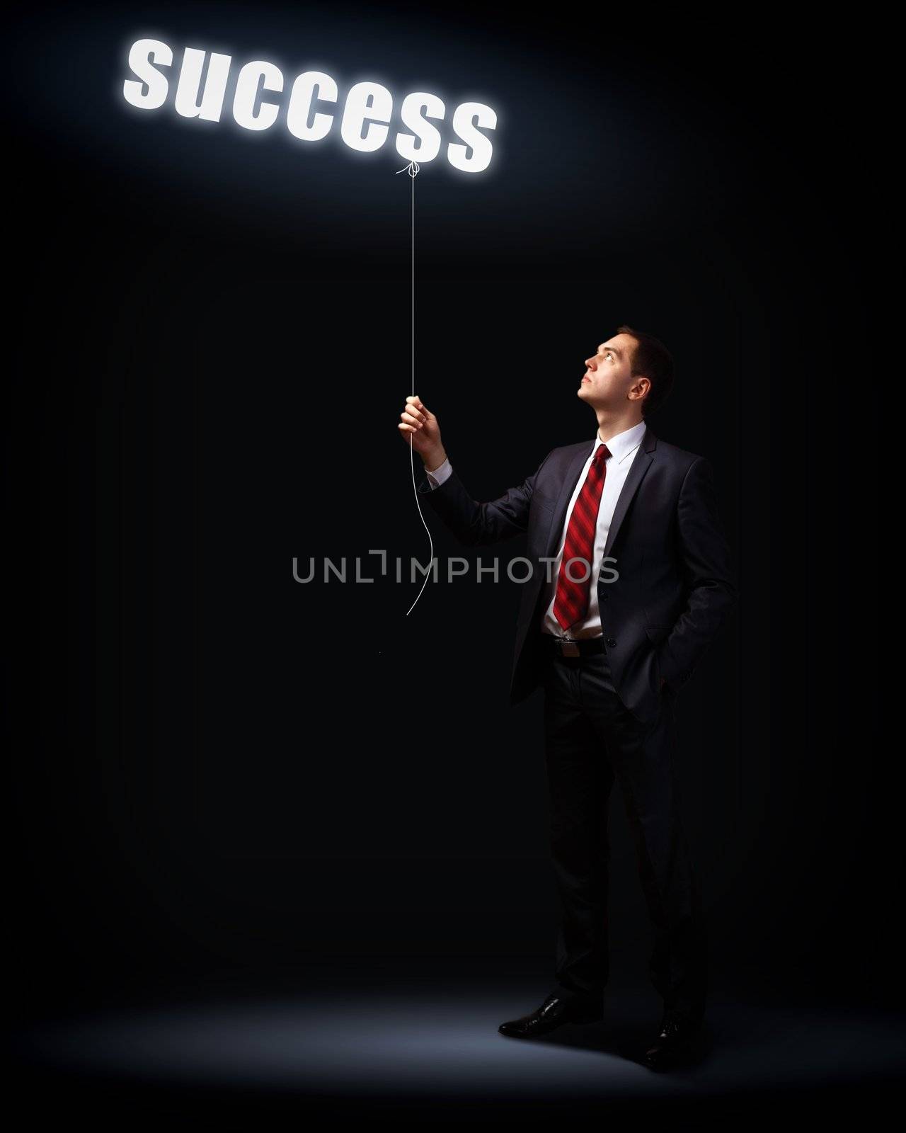 Light bulb and a business person as symbols of creativity in business