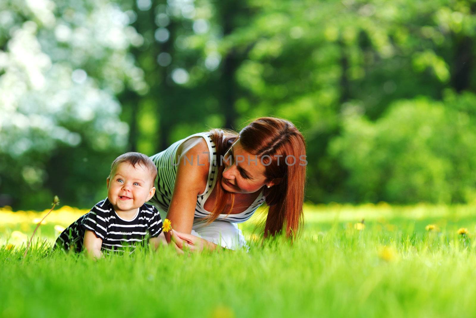 mother and child on grass