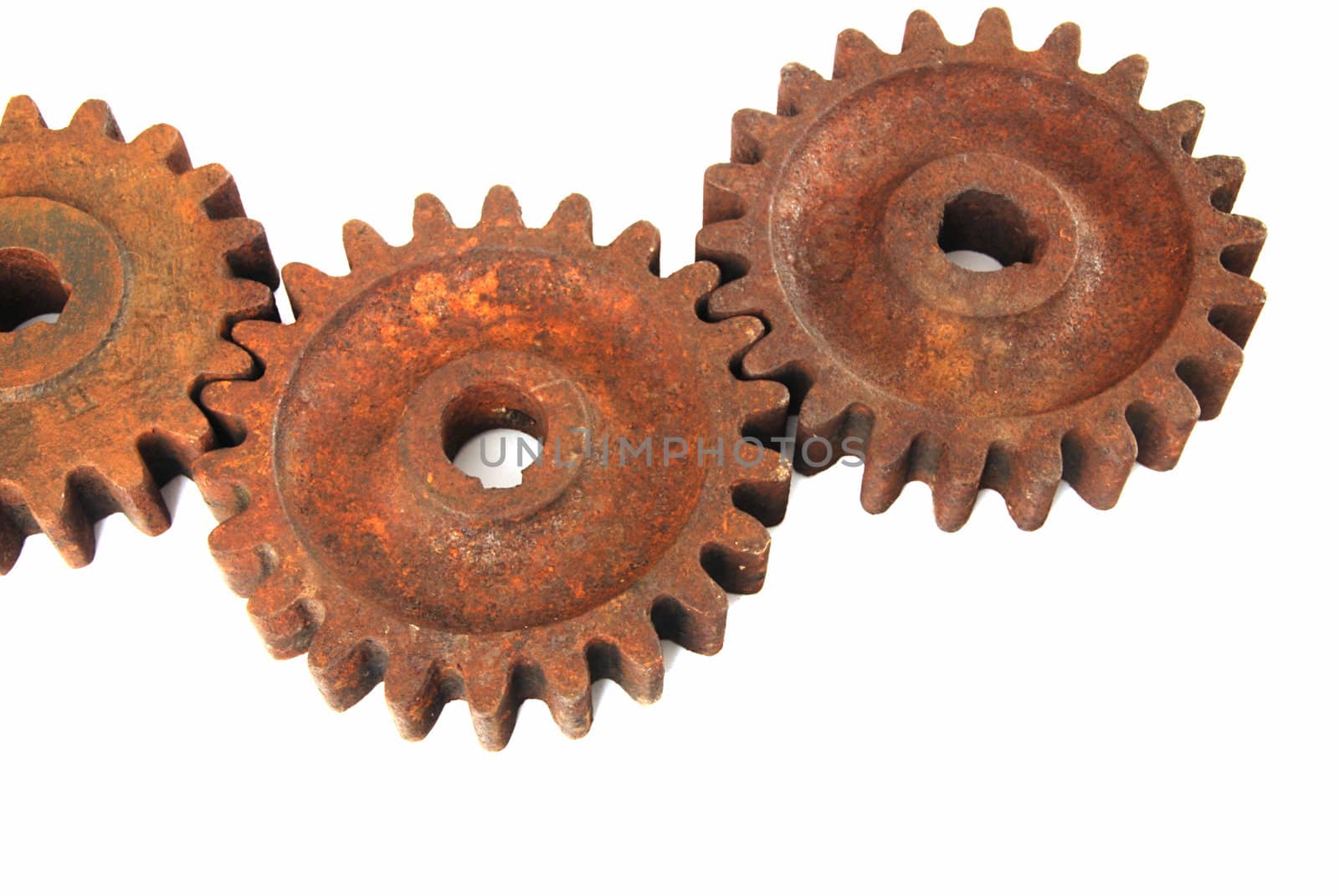 Old rusty gear cogs isolated on white background