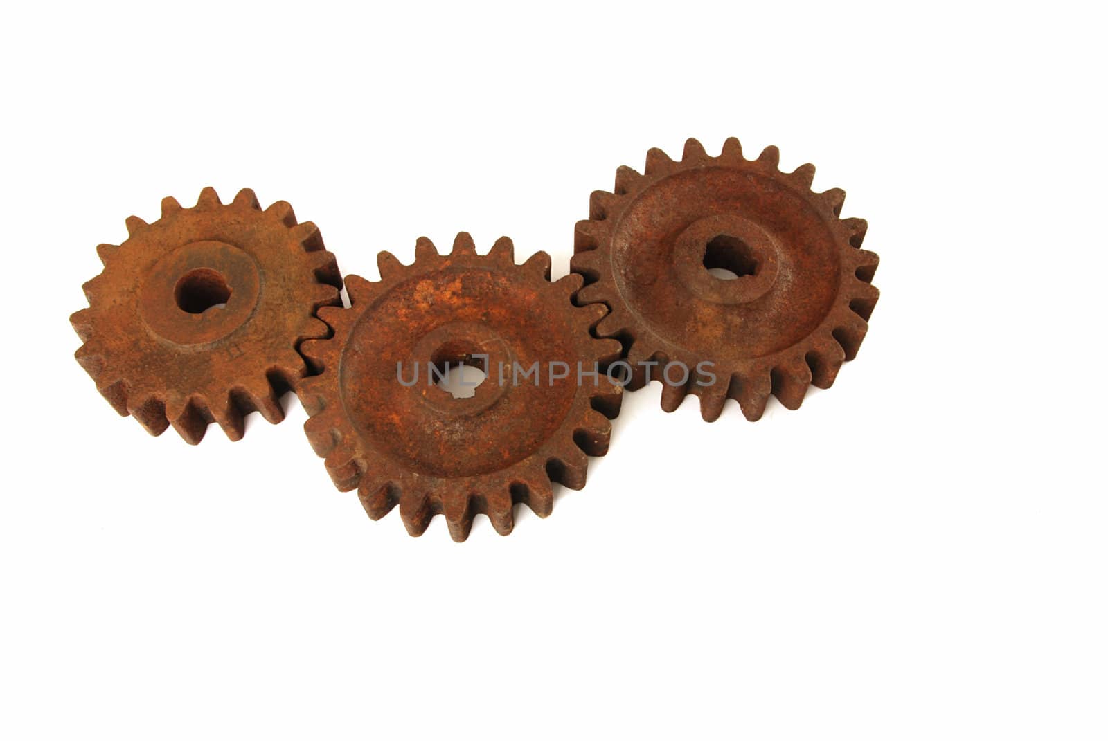 Old rusty gear cogs isolated on white background