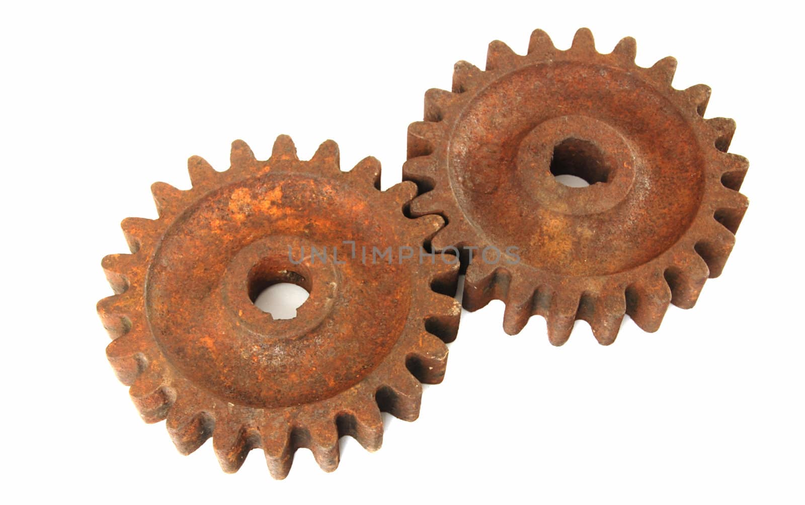 Old rusty gear cogs isolated on white background