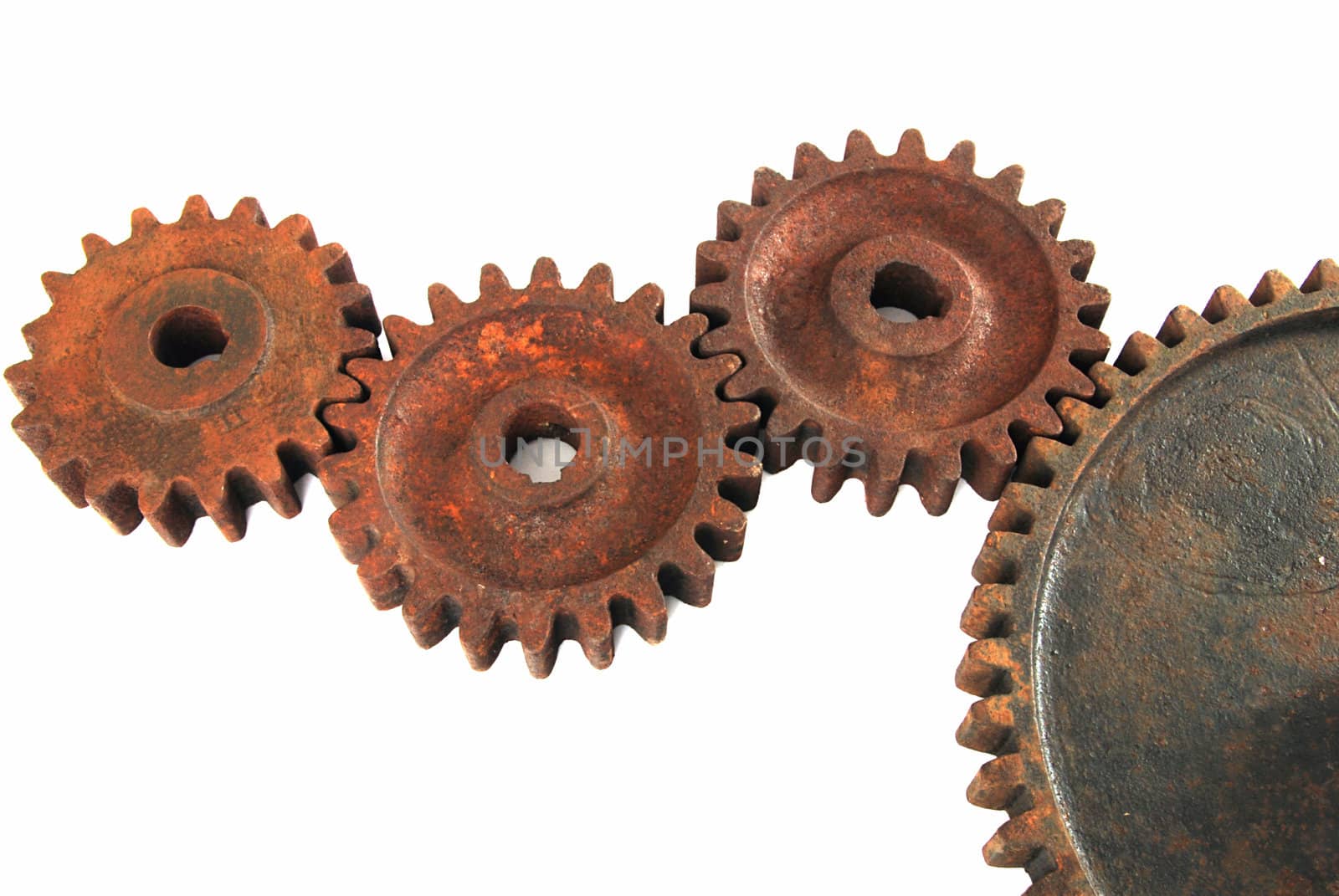 Old rusty gear cogs isolated on white background