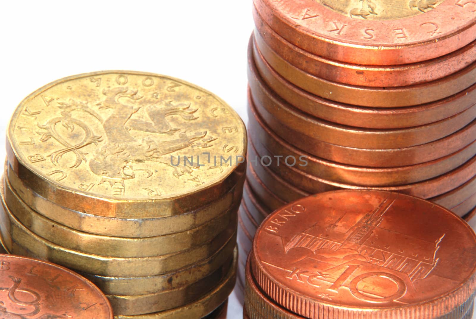 Several column of various Czech crowns coins