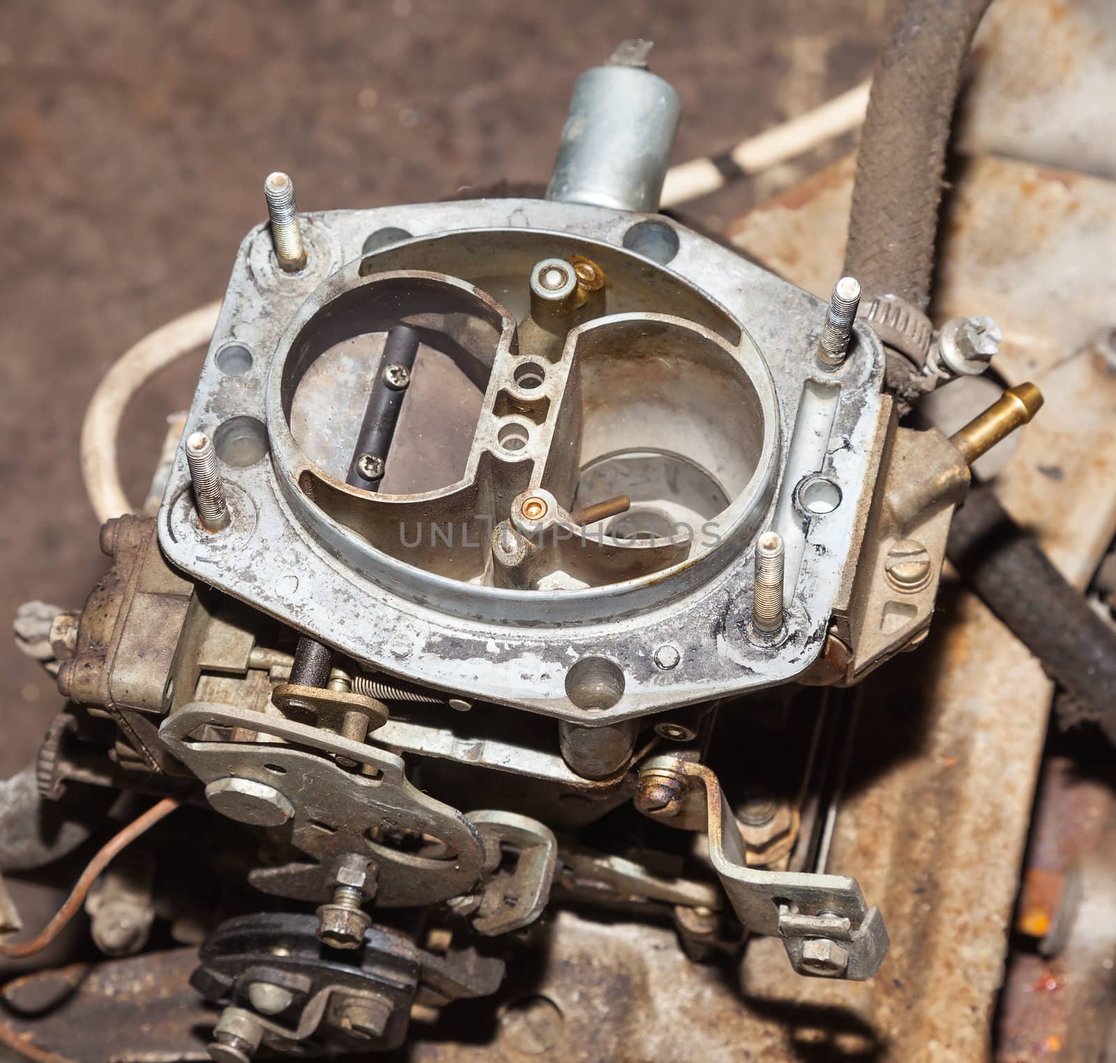 car's carburetor with the cover removed. top view