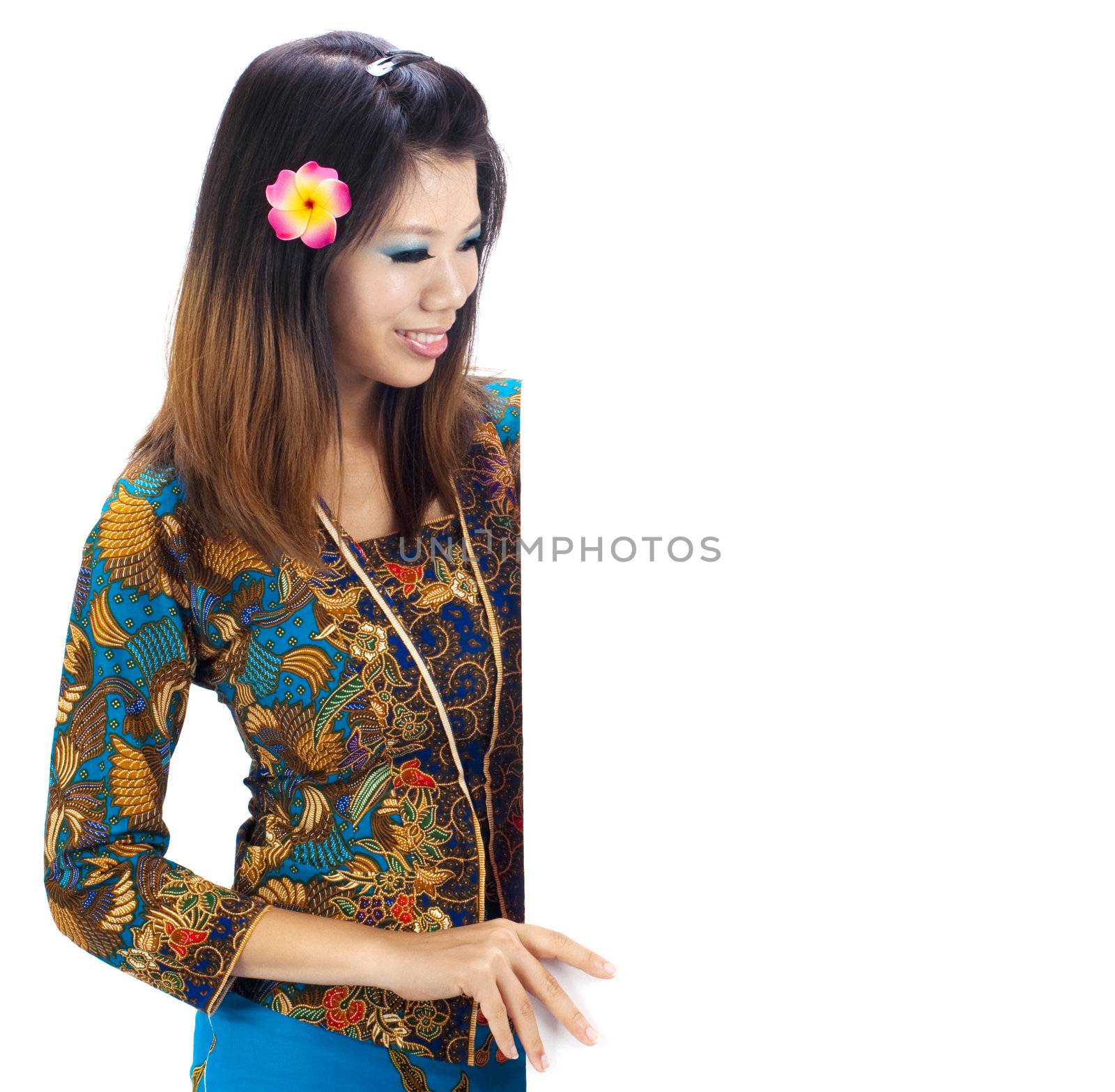 Asian women with Traditional Kebaya holding a blank sign.