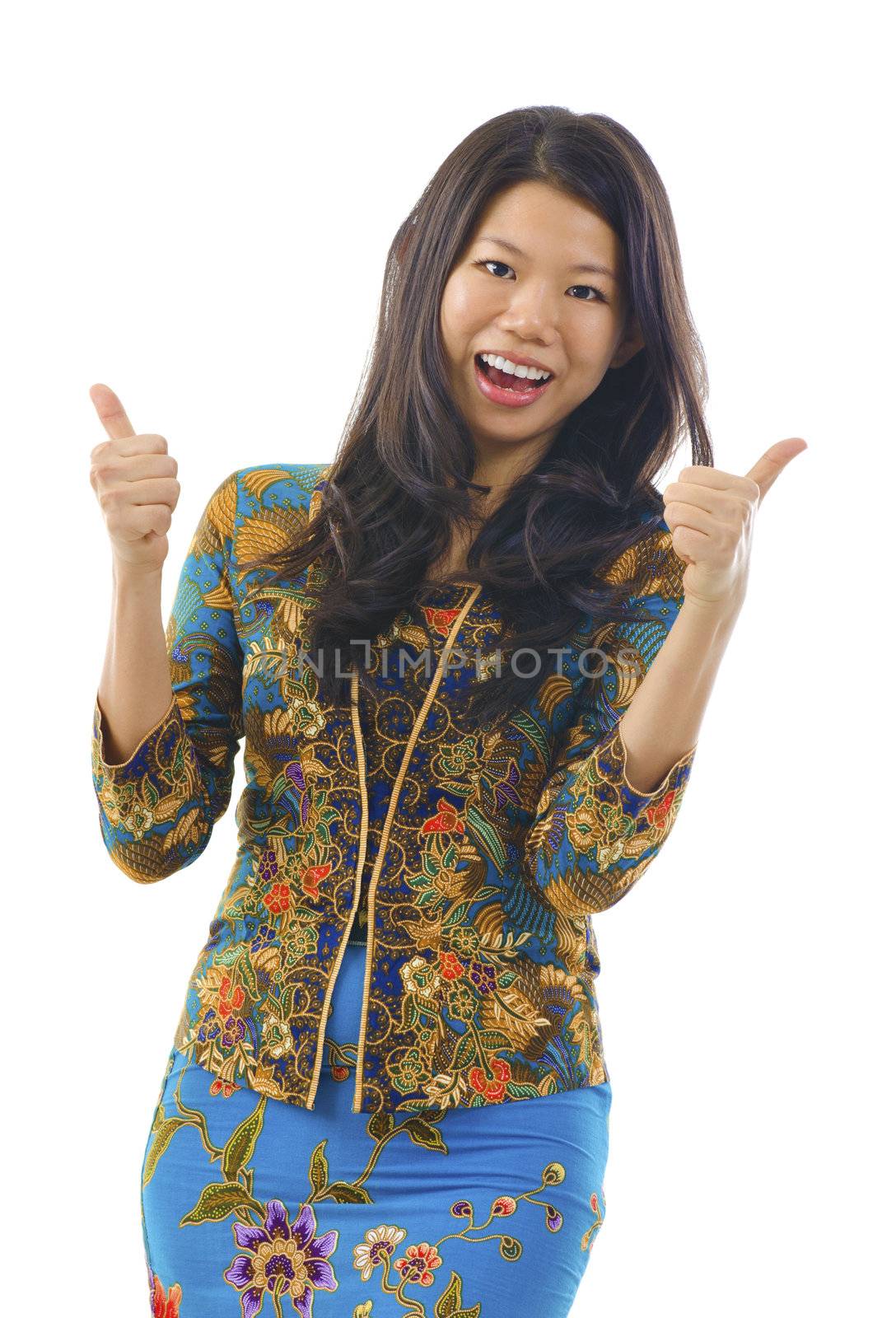Thumbs up Asian woman in kebaya, over white background