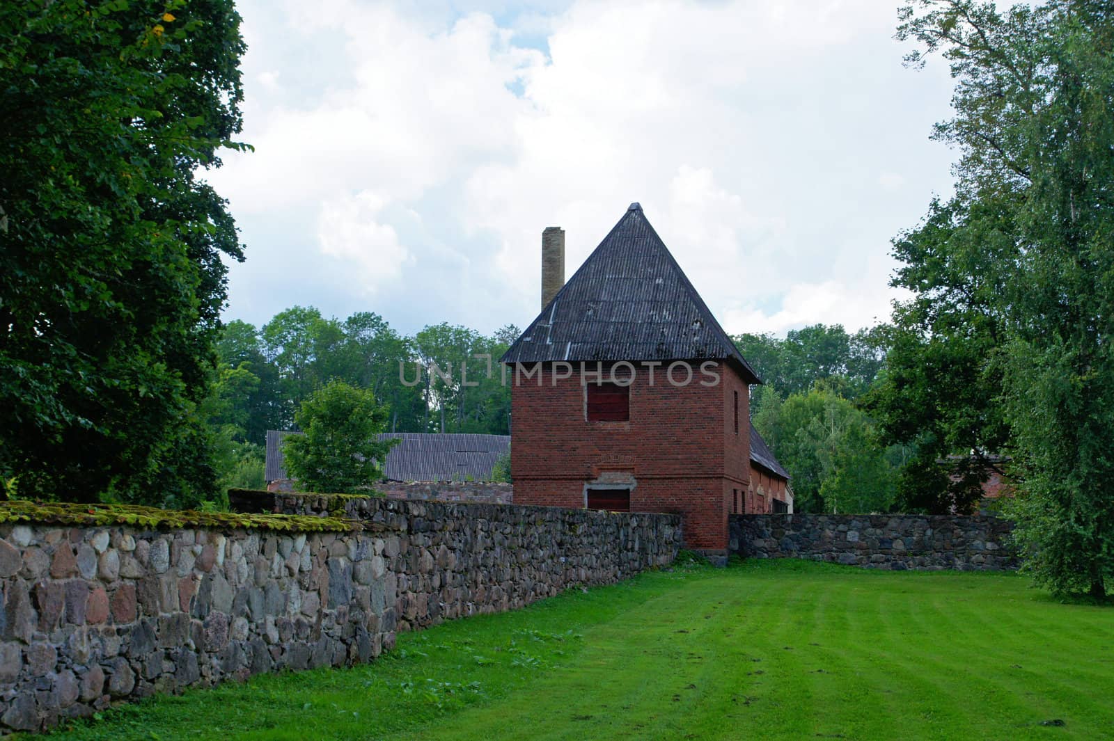 Old watch tower and wall of manor