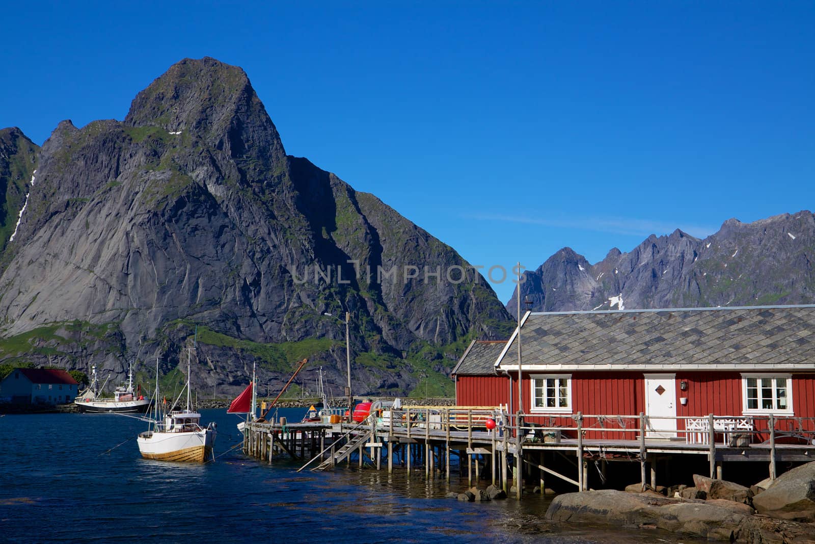 Fishing huts in town of Reine by the fjord on Lofoten islands in Norway