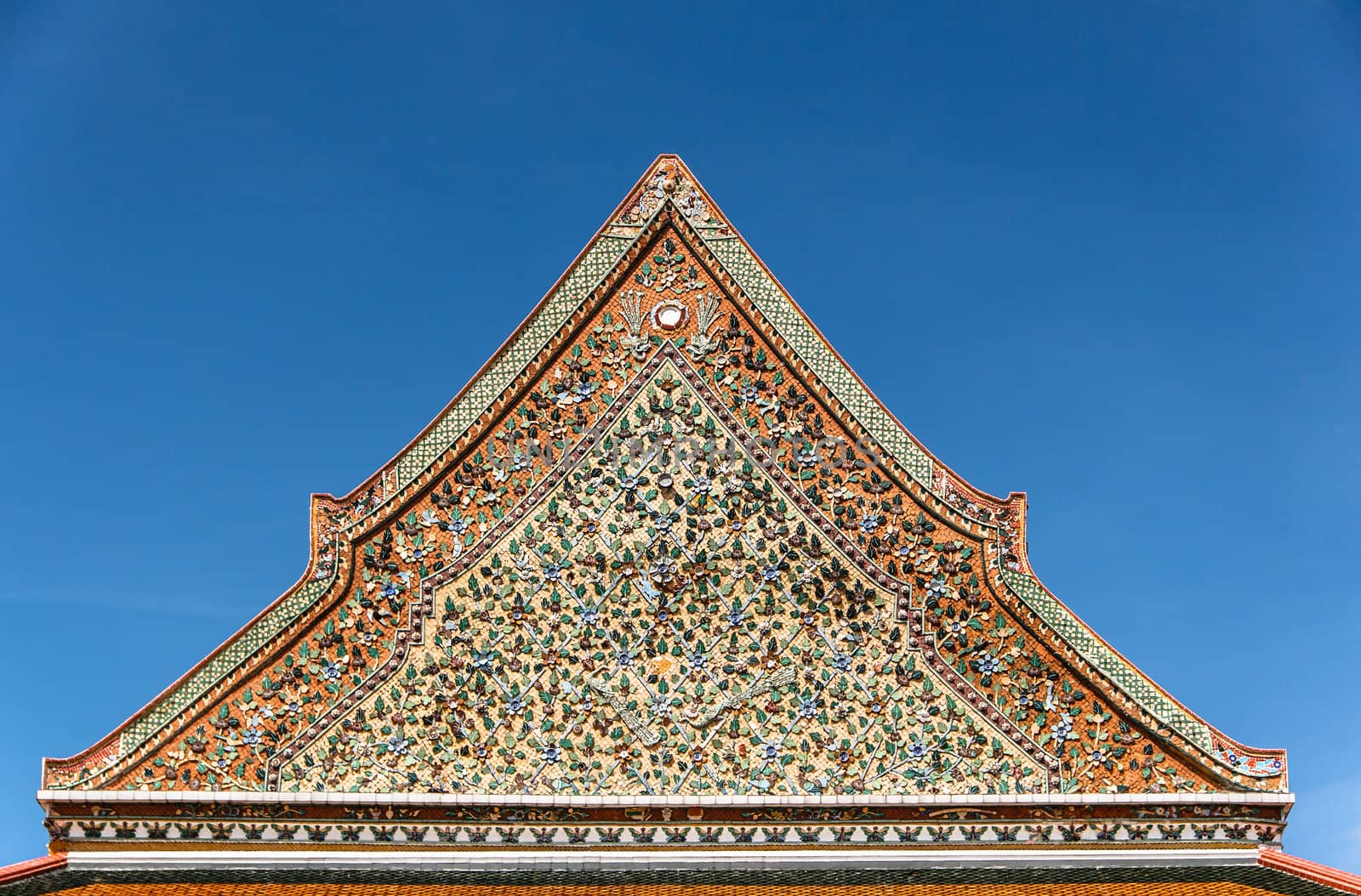 The top part of traditional Thai Chinese style architecture church in Thailand.