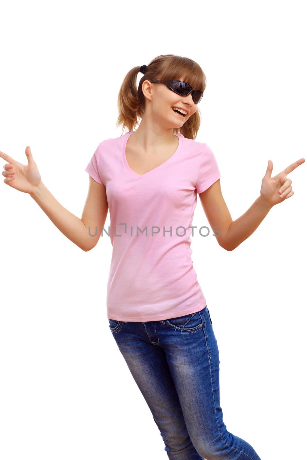 Happy smiling girl dancing and listening to music