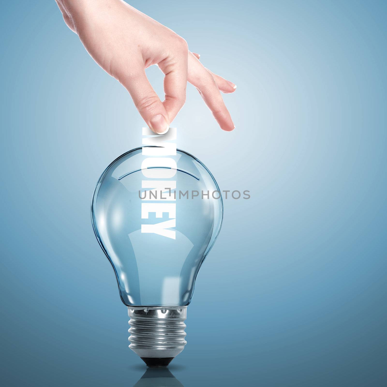 Hand and money inside an electric light bulb