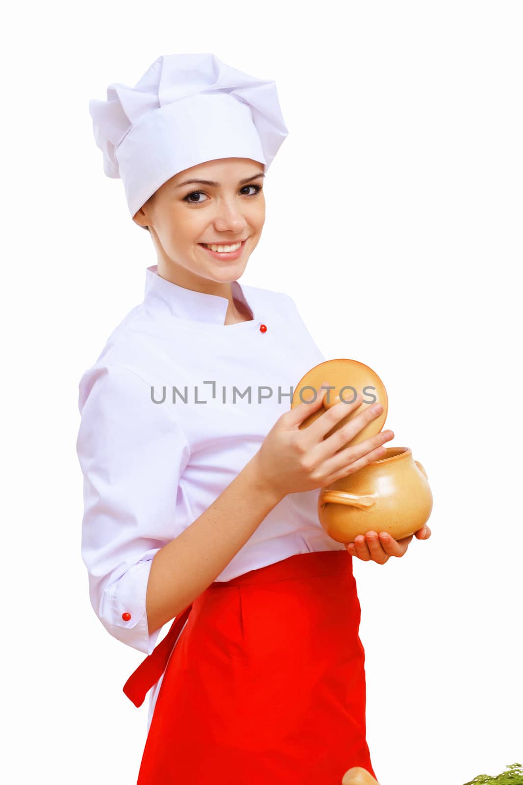 Young cook preparing food wearing a red apron