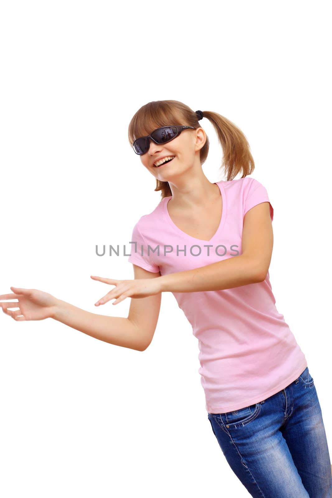 Happy smiling girl dancing and listening to music