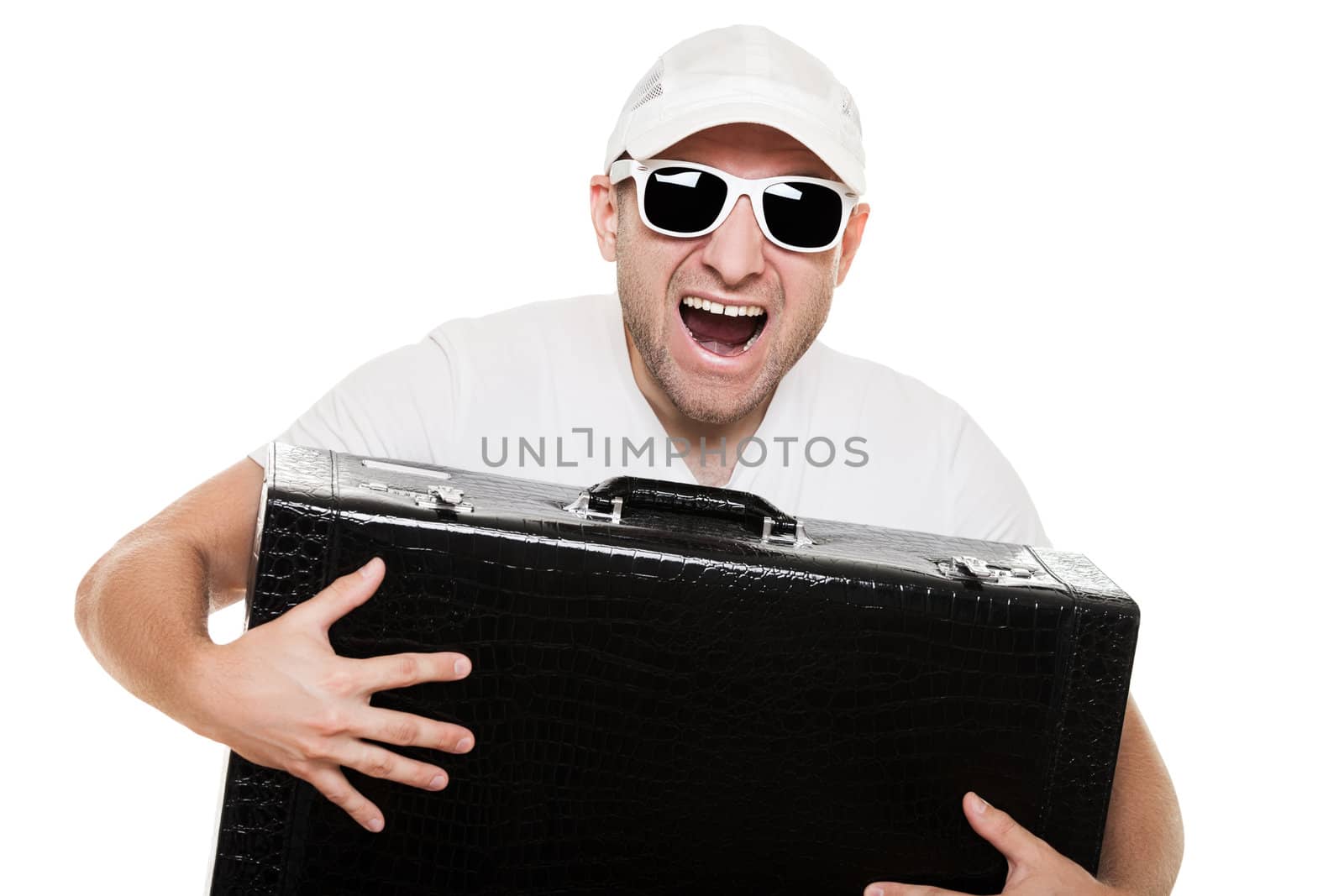 Cool smiling man in sunglasses hand holding large travel luggage suitcase white isolated