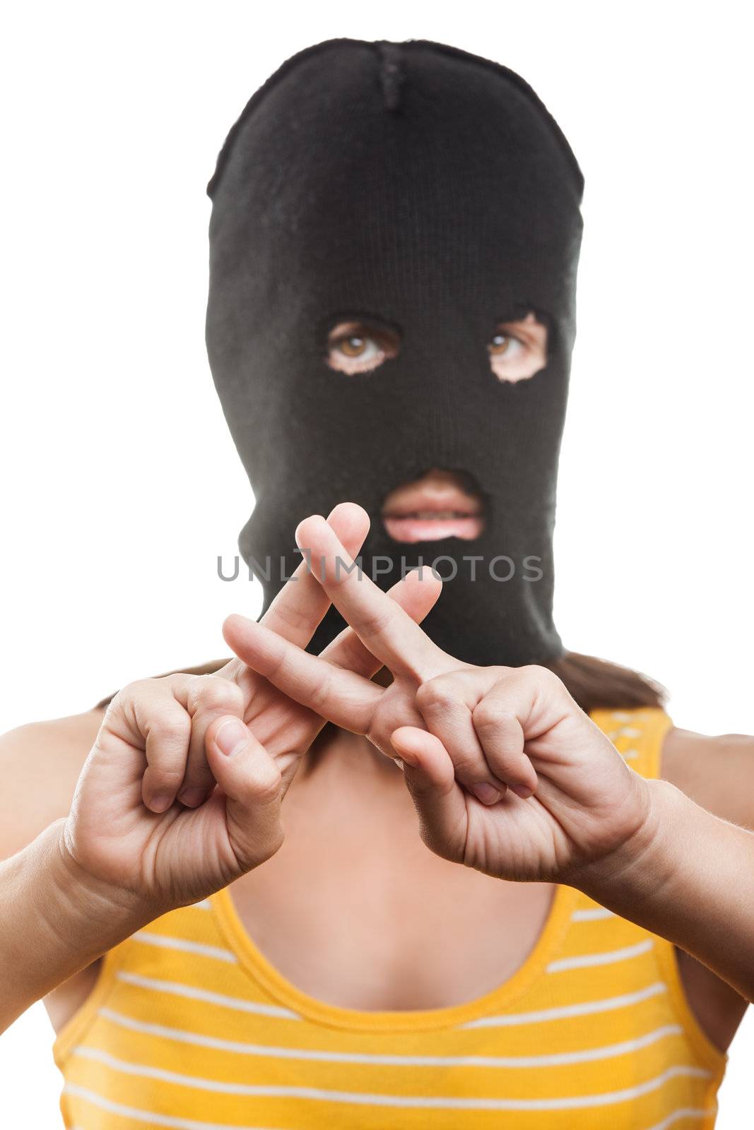 Woman in balaclava showing jail or prison finger gesture by ia_64