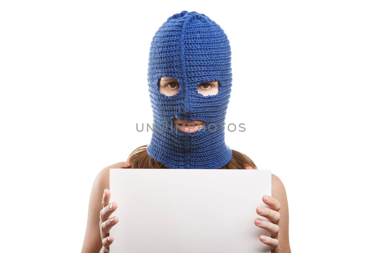 Woman in balaclava holding blank card by ia_64