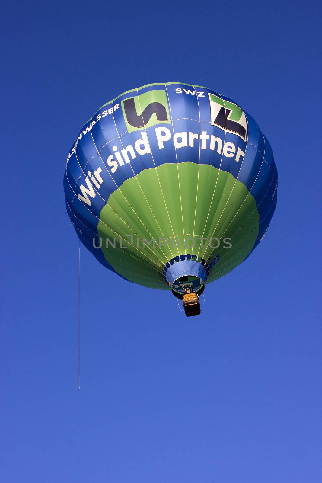 Colorful Hot Air Balloon in Flight by miradrozdowski