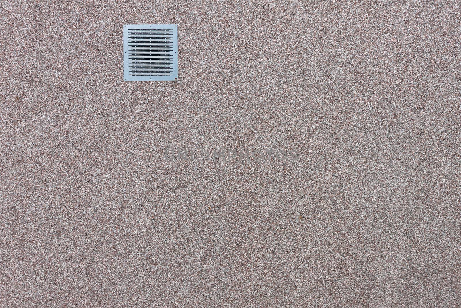 Old metal rusty ventilation windows on granite wall background