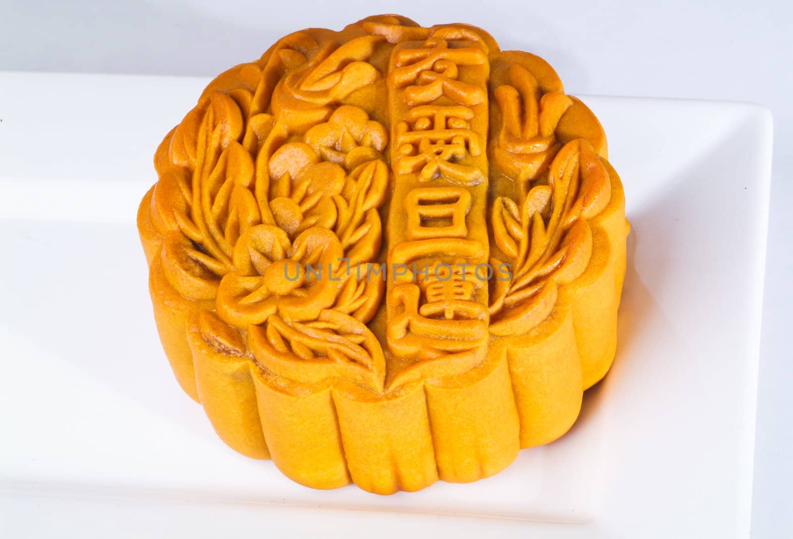 Mooncake, the Chinese words on the mooncake is 'ingredient', not a logo or trademark.