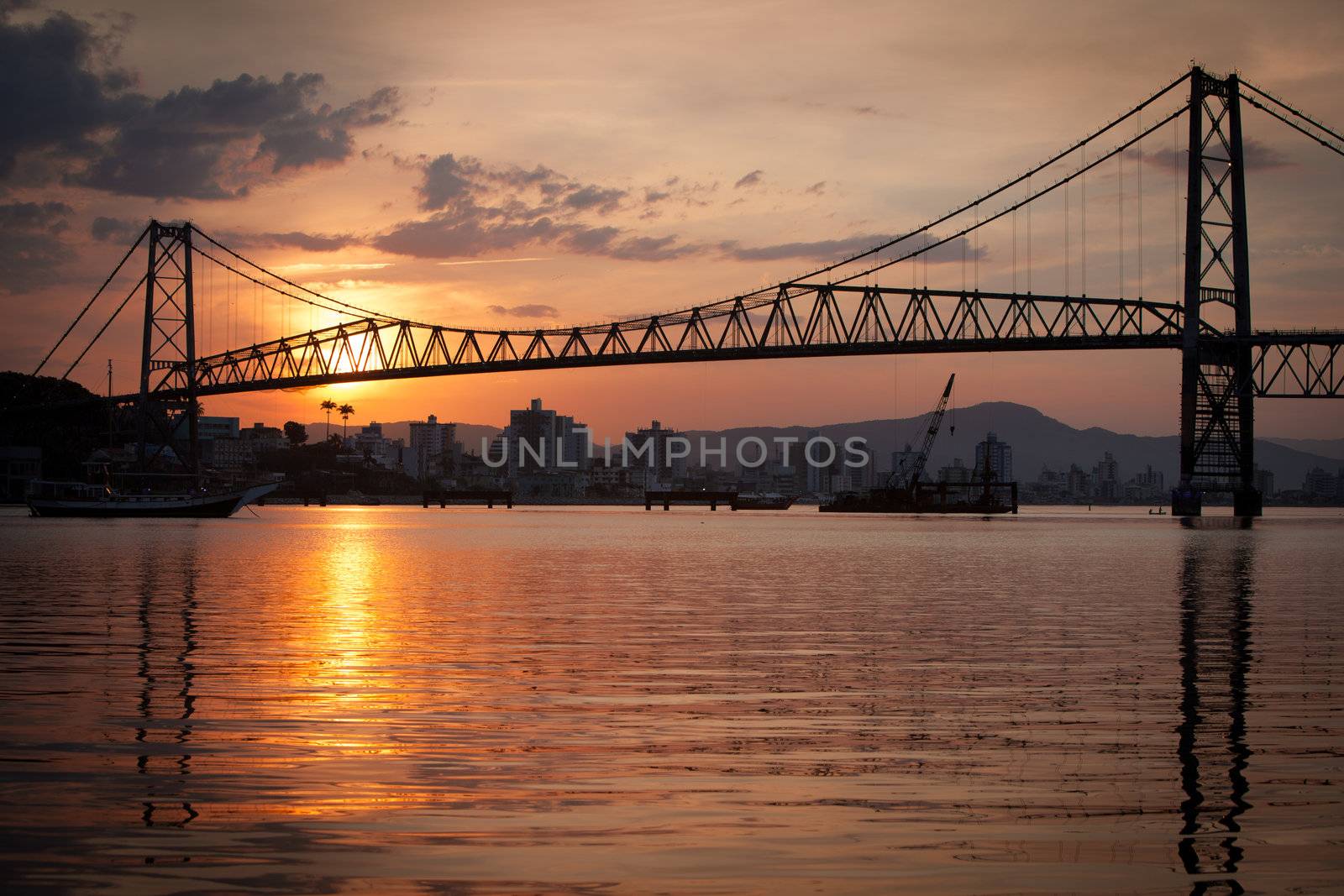 The Hercilio Luz Bridge, in Florianopolis, Brazil, with an amazing sunset.