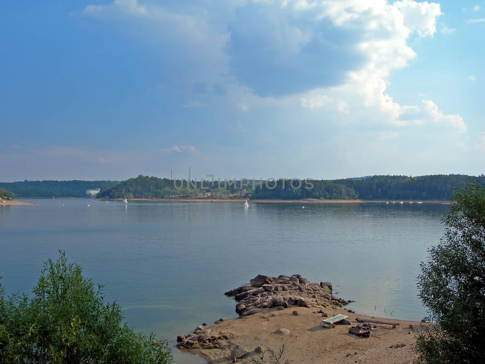    Lake with ships, beach and campfire       