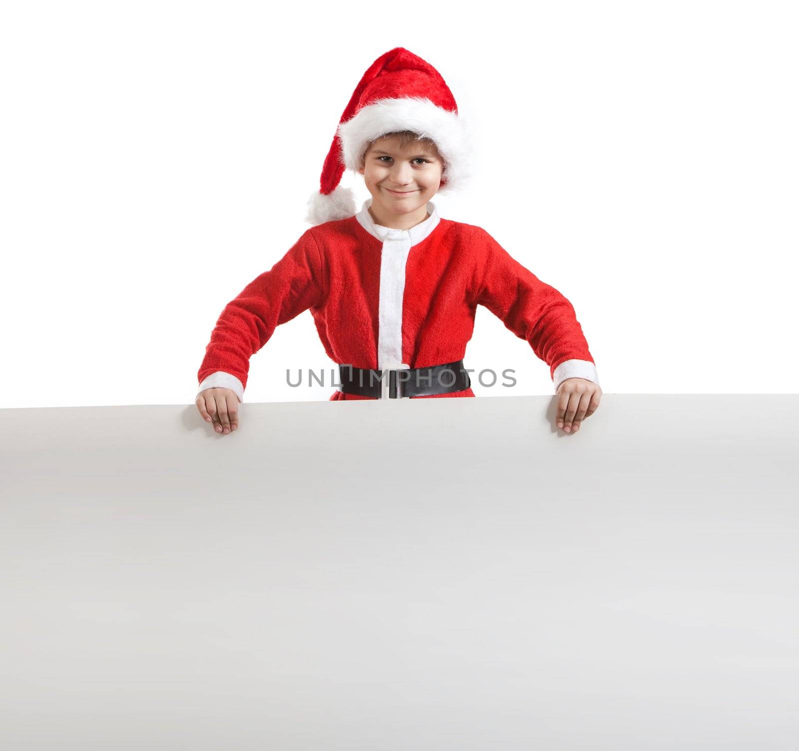 Boy holding a poster isolated on white background
