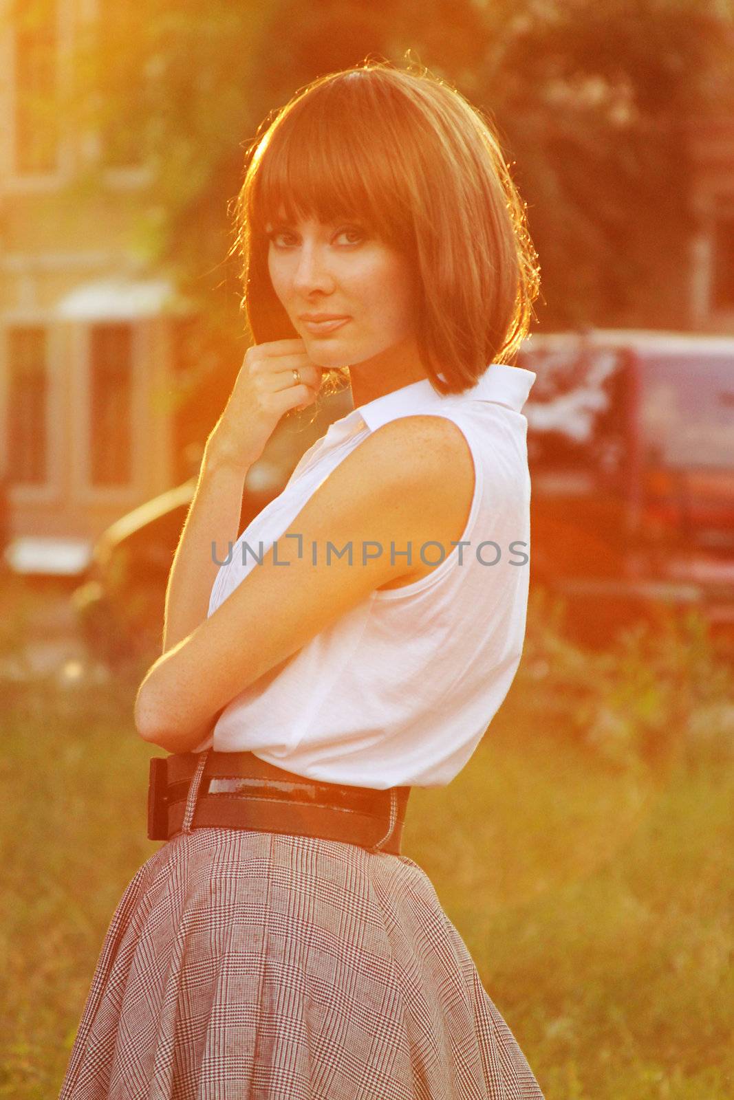 Retro brunette woman in sunset light by Angel_a