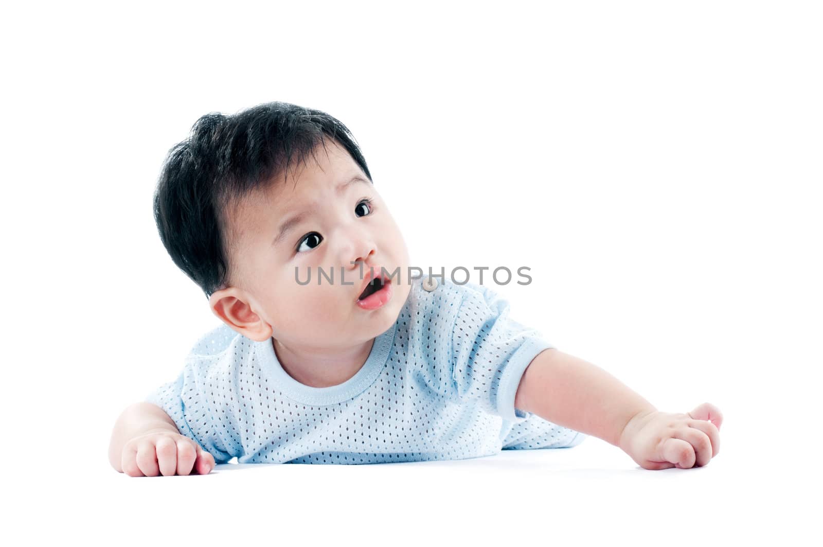 Portrait of a cute infant baby with blank expression over white background.