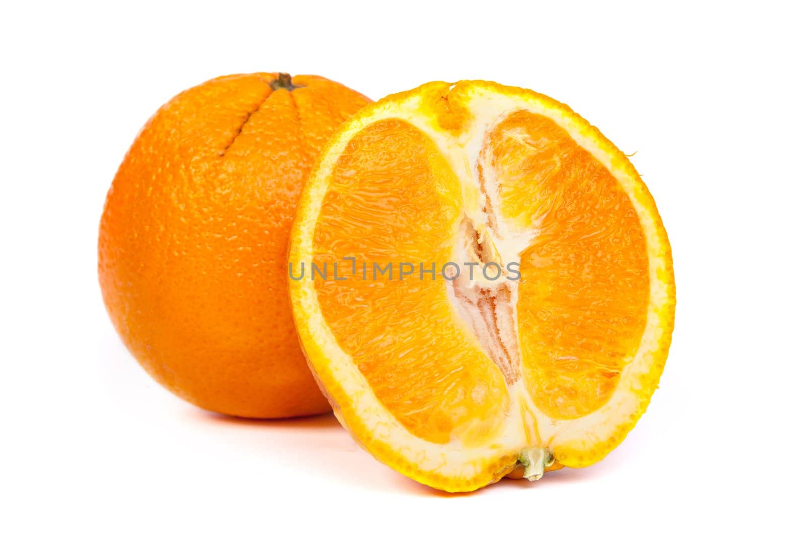 Fresh orange and a half part of orange isolated on a white background