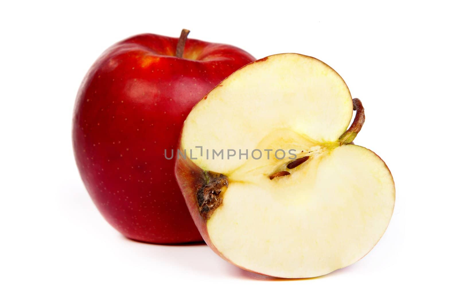 Cross section of red apple, showing pips, and core. Isolated on white,